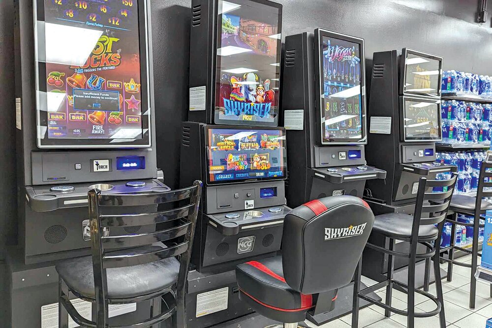 At the Rountree neighborhood Rapid Robert's convenience store, four of the newly banned gaming devices remained operational the morning of Feb. 13, with workers saying they were unaware of the new city law.